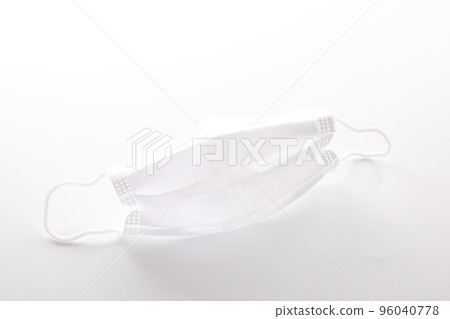 Used white mask isolated in white background Used white mask isolated in white background 96040778