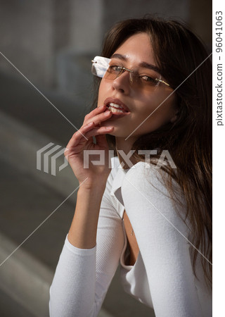 Photo of cheerful glad nice woman wear white blause and sunglass 96041063