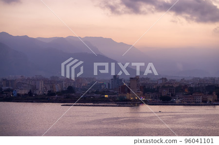 City on Mediterranean Coast with mountains in background in Palermo, Sicily, Italy City on Mediterranean Coast with mountains in background in Palermo, Sicily, Italy 96041101
