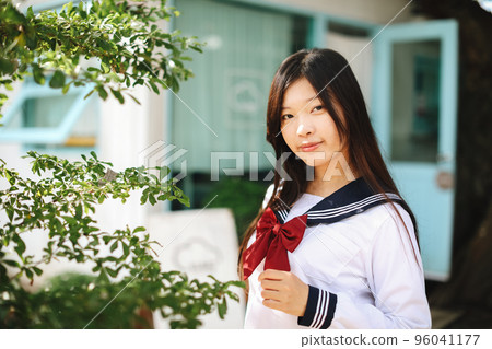 Japanese school girl in local coffee shop Japanese school girl in local coffee shop 96041177