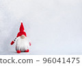 Christmas gnome in red hat holiday banner on light winter background 96041475