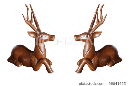 two wooden deers, old long horned wood deer sit and looking on white background, object, animal ,decor, gift, copy space 96041635