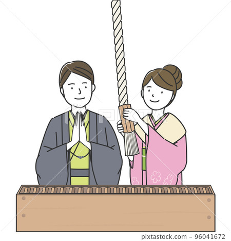 Men and women in kimonos visiting a shrine 96041672