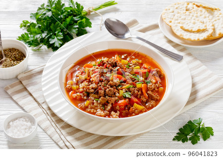 Hamburger Soup with barley and vegetables in bowl Hamburger Soup with barley and vegetables in bowl 96041823