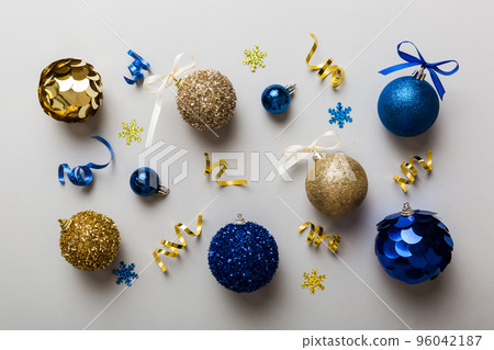 Christmas ball on colored background. decoration bauble with ribbon bow with copy space 96042187