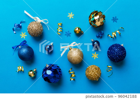 Christmas ball on colored background. decoration bauble with ribbon bow with copy space 96042188