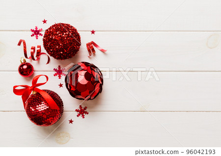 Christmas ball on colored background. decoration bauble with ribbon bow with copy space 96042193