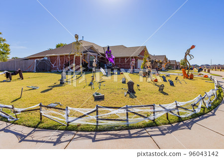 Sunny view of Halloween decoration in front yard 96043142