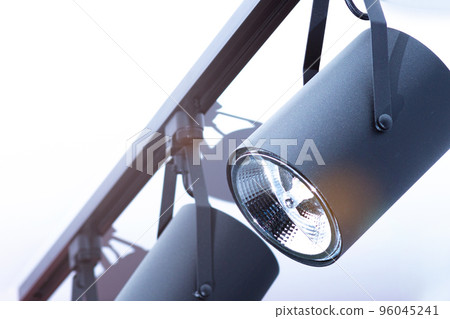 moving light fixed on the ceiling in the form of a group of black lamps 96045241