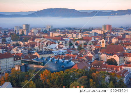 Cityscape of Graz from Shlossberg hill, Graz, Styria region, Austria, in autumn, at sunrise Cityscape of Graz from Shlossberg hill, Graz, Styria region, Austria, in autumn, at sunrise 96045494