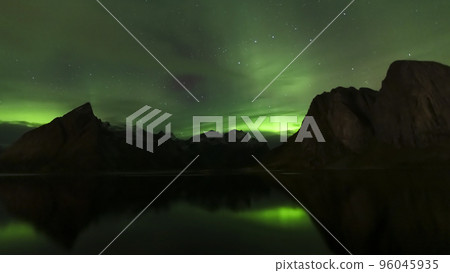 Panorama of the Aurora borealis over the mountains. 96045935