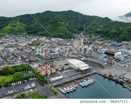 Aerial view of the harbor in Saiki City, Oita Prefecture covered in clouds after the rain Aerial view of the harbor in Saiki City, Oita Prefecture covered in clouds after the rain 96047521
