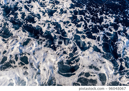 Top down aerial view of sea water surface. White foam waves texture as natural background. 96048067