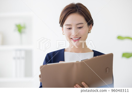 Business Portrait of a woman working Business Portrait of a woman working 96048311