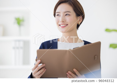 Business Portrait of a woman working Business Portrait of a woman working 96048312