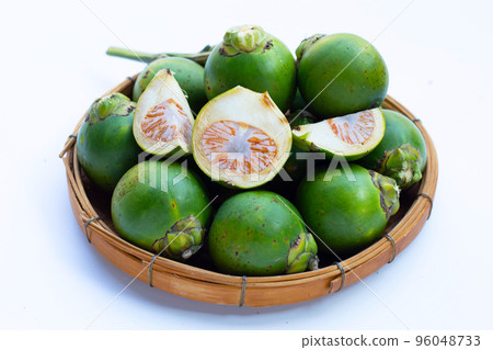 Betel nuts on white background. Betel nuts on white background. 96048733