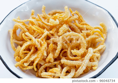 Crispy pork rinds or pork snack. Crispy pork rinds or pork snack. 96048734