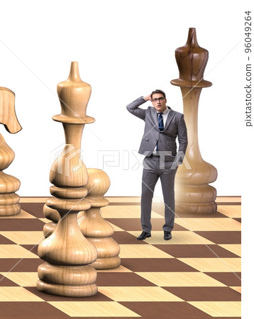 Businessman in large chess board in strategy concept Businessman in large chess board in strategy concept 96049264