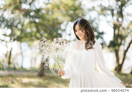 Woman in a dress, natural garden wedding 96054074