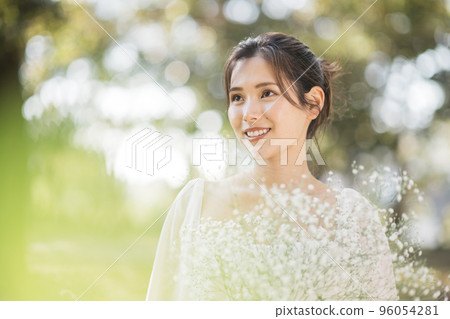 Woman in a dress, natural garden wedding 96054281