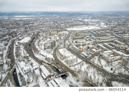 City panorama from the height of the drone flight. Residential area of brick houses in the winter. Aerial view. Nizhny Tagil, Russia 96054514
