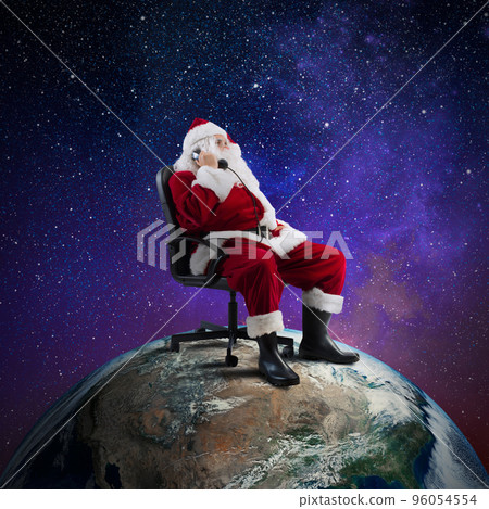 Santa Claus receives requests via telephone Santa Claus receives requests via telephone 96054554