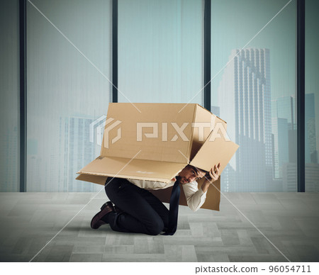 Afraid businessman Afraid businessman 96054711