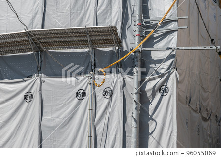 Temporary scaffolding at a demolition site 96055069