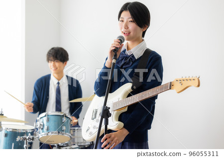 Drummer high school girl drum class Drummer high school girl drum class 96055311