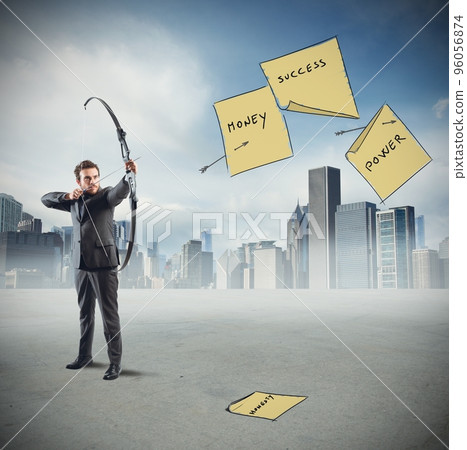 Businessman pointing and hits 96056874