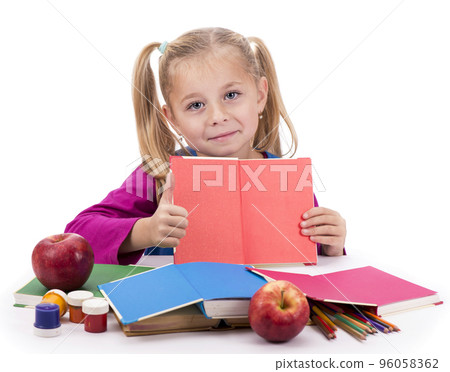 Little smart girl holding a book and reading it, on a white background Little smart girl holding a book and reading it, on a white background 96058362