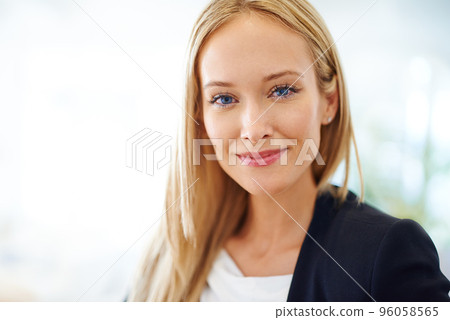 Theres no stopping her in the business world. Shot of well dressed woman looking at the camera. 96058565