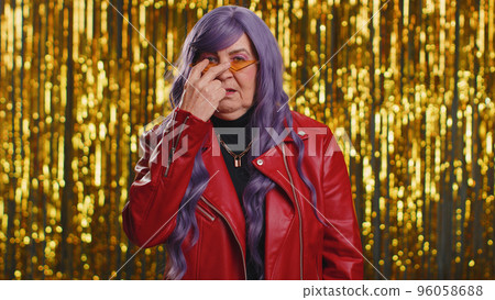 Serious woman pointing at his eyes show I am watching you gesture spying on someone guilty disbelief 96058688