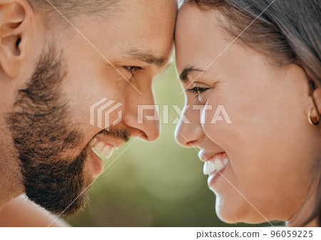 Face of happy couple touching head in love, care and happiness in garden, park or spring nature outdoors. Closeup young, smile and happy people, man and woman relax together on romantic summer date Face of happy couple touching head in love, care and happiness in garden, park or spring nature outdoors. Closeup young, smile and happy people, man and woman relax together on romantic summer date 96059225