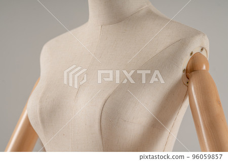 Vintage mannequin with hands on a light studio background 96059857