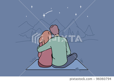 Happy couple hugging in mountains together Happy couple hugging in mountains together 96060794