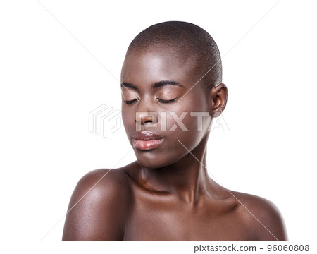 Femininity is the ultimate form of sophistication. Studio shot of a beautiful young african woman isolated on white. Femininity is the ultimate form of sophistication. Studio shot of a beautiful young african woman isolated on white. 96060808