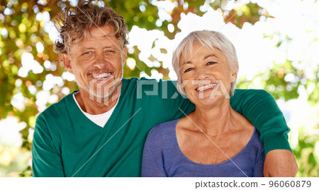 Theyre best friend through life. Portrait of a mature couple sitting outdoors. 96060879