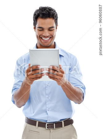 Connected to social media 247. Studio shot of a handsome young man using a digital tablet isolated on white. 96060887