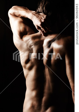 Masculinity in portrait. Studio shot of a muscular shirtless man isolated on black. 96060943