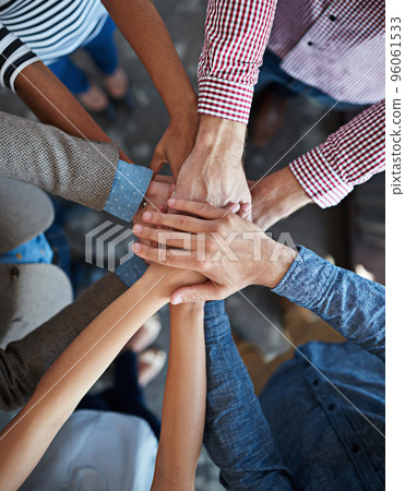 Lets do this team. Modern office space with candid creative business people interacting with each other. Lets do this team. Modern office space with candid creative business people interacting with each other. 96061533