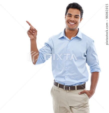 How do you like this. studio shot of a handsome young man pointing at copyspace. How do you like this. studio shot of a handsome young man pointing at copyspace. 96061915