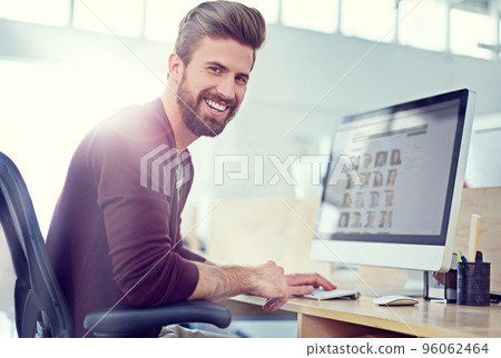 His designs are exemplary. Shot of a designer at work in an office. His designs are exemplary. Shot of a designer at work in an office. 96062464