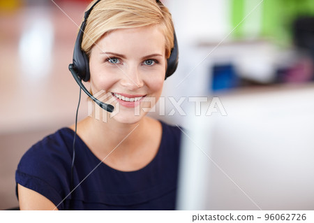 Im here to assist. Cropped portrait an attractive young businesswoman working on her computer. 96062726