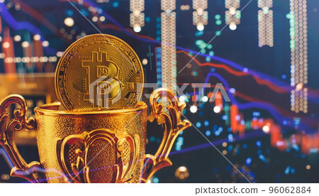 Cryptocurrency concept , Golden bitcoin on winners cup background mainboard , The future of money. Computational equipment. Cryptocurrency concept , Golden bitcoin on winners cup background mainboard , The future of money. Computational equipment. 96062884