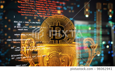 Golden coins with bitcoin symbol buy on a mainboard. Stock Market Concept, digital money and stock business. 96062941