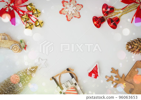 Happy New Year holiday concept. New Year decorations, tree, snowflake, pine cone, gifts on background. Holiday party greeting card mockup with copy space. Flat lay, top view, overhead. 96063653