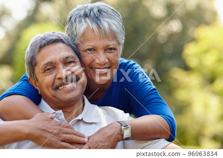 This is what real love looks like. Shot of a loving senior couple enjoying quality time together outdoors. This is what real love looks like. Shot of a loving senior couple enjoying quality time together outdoors. 96063834