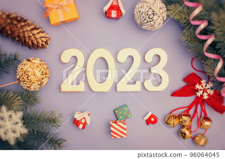 Christmas tree with decoration and lightingt 2023 , Elegant Christmas tree in glass jar with bokeh lights background, copy space. Christmas and new year concept. Christmas tree with decoration and lightingt 2023 , Elegant Christmas tree in glass jar with bokeh lights background, copy space. Christmas and new year concept. 96064045