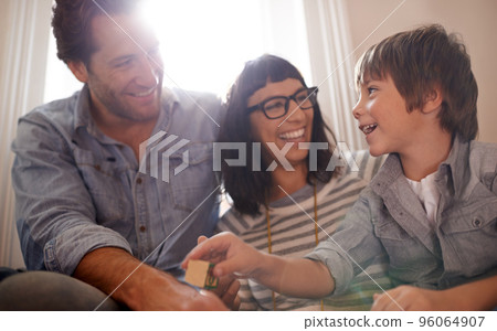Taking the time to listen.... A mother and father sitting with their son. Taking the time to listen.... A mother and father sitting with their son. 96064907